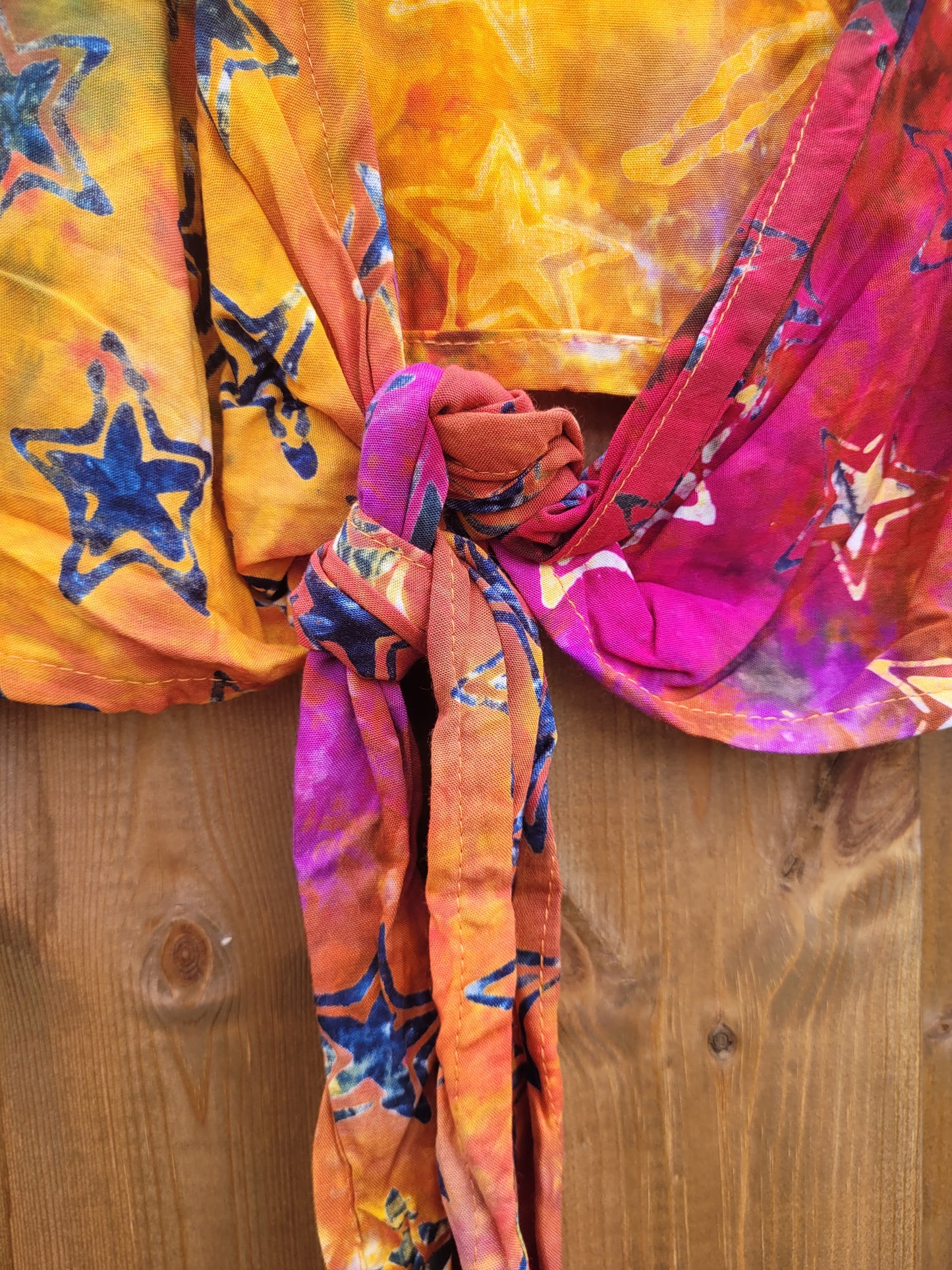 Celestial wrap top