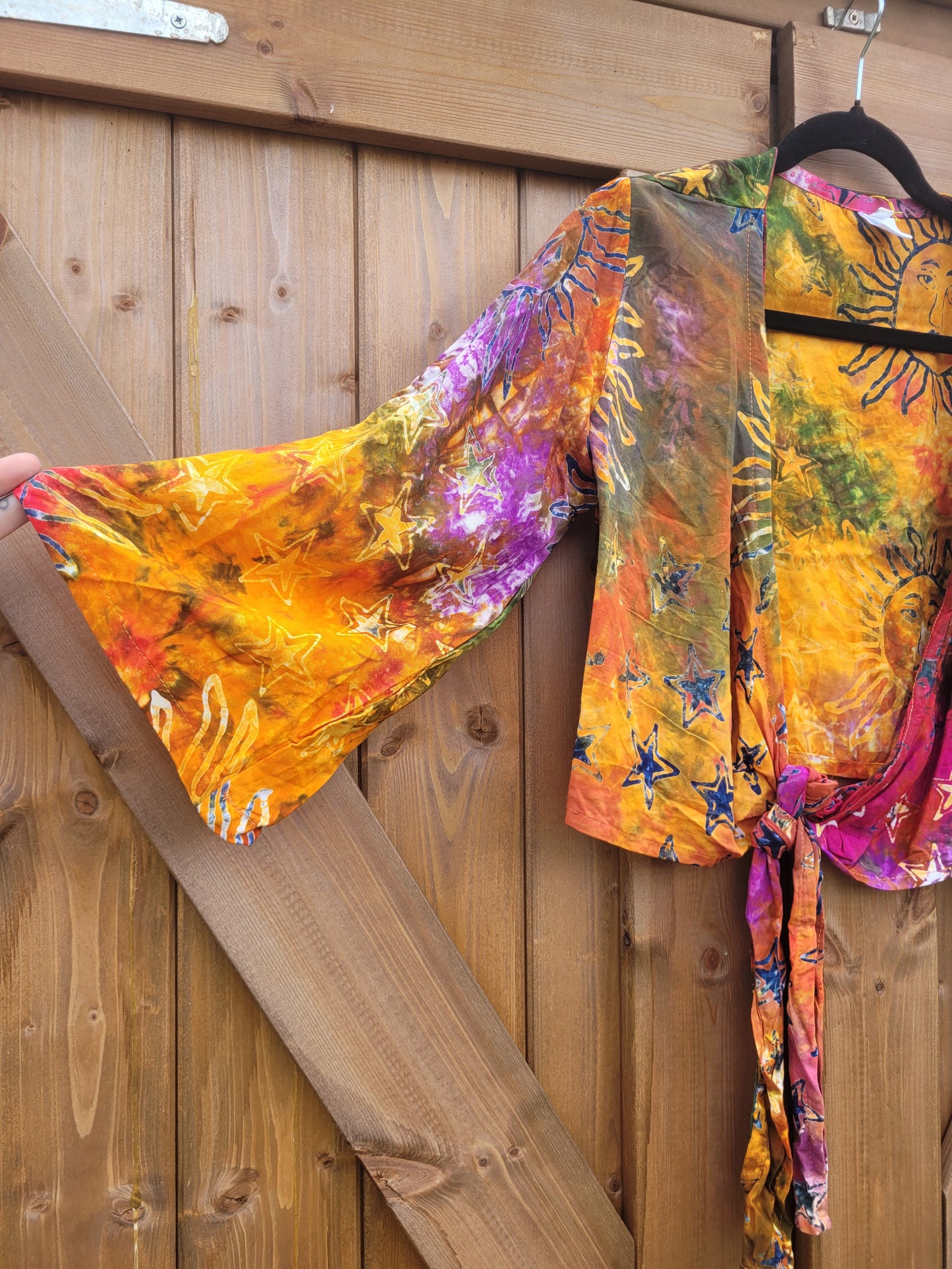 Celestial wrap top
